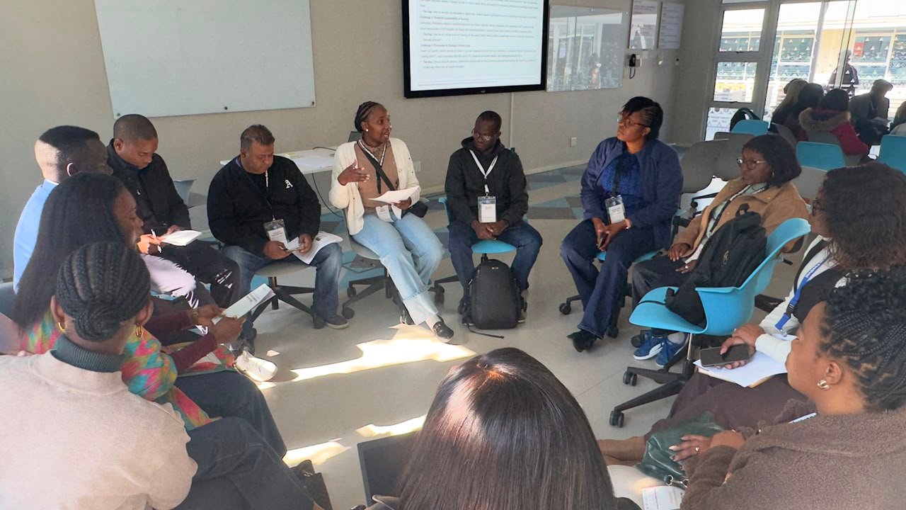 Adult facilitator presenting to a learning session